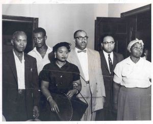 Picture taken in September 1955.  Left to Right: Walter Reed( Willie Reed's grandfather), unidentified trial witness, Mamie Till Mobley (Till's mother), T.R.M. Howard, Rep. Charles Diggs of Michigan, Amanda Bradley (trial witness). Credit: Press-Scimitar Collection, Special Collections, University of Memphis Libraries.