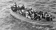 Survivors aboard one of the Titanic's four collapsible lifeboats. Note the canvas sides.